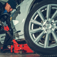 Changing you seasonal tires at home - floor jack.