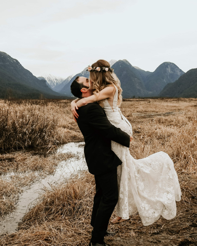 Patrick lifting stephanie up and kissing in the moorlands