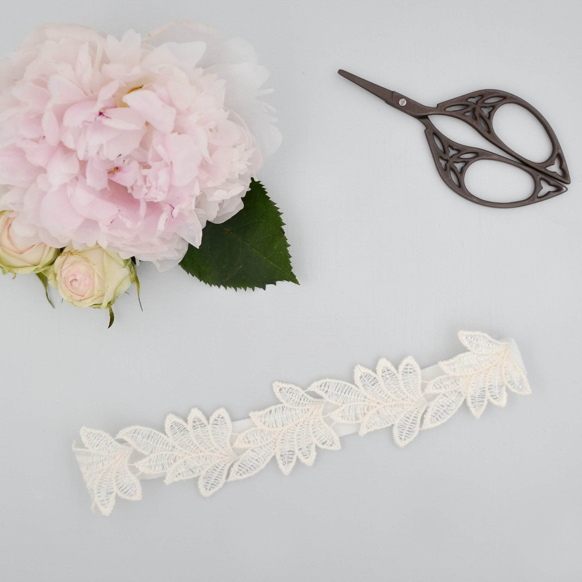 Super Sleek Lace Leaf Wedding Garter Ferne Britten Weddings