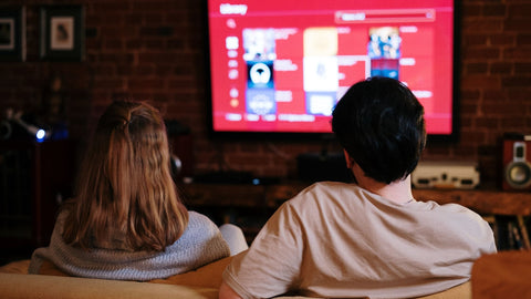 A couple watching TV