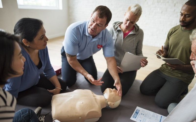 people learning cpr first aid training