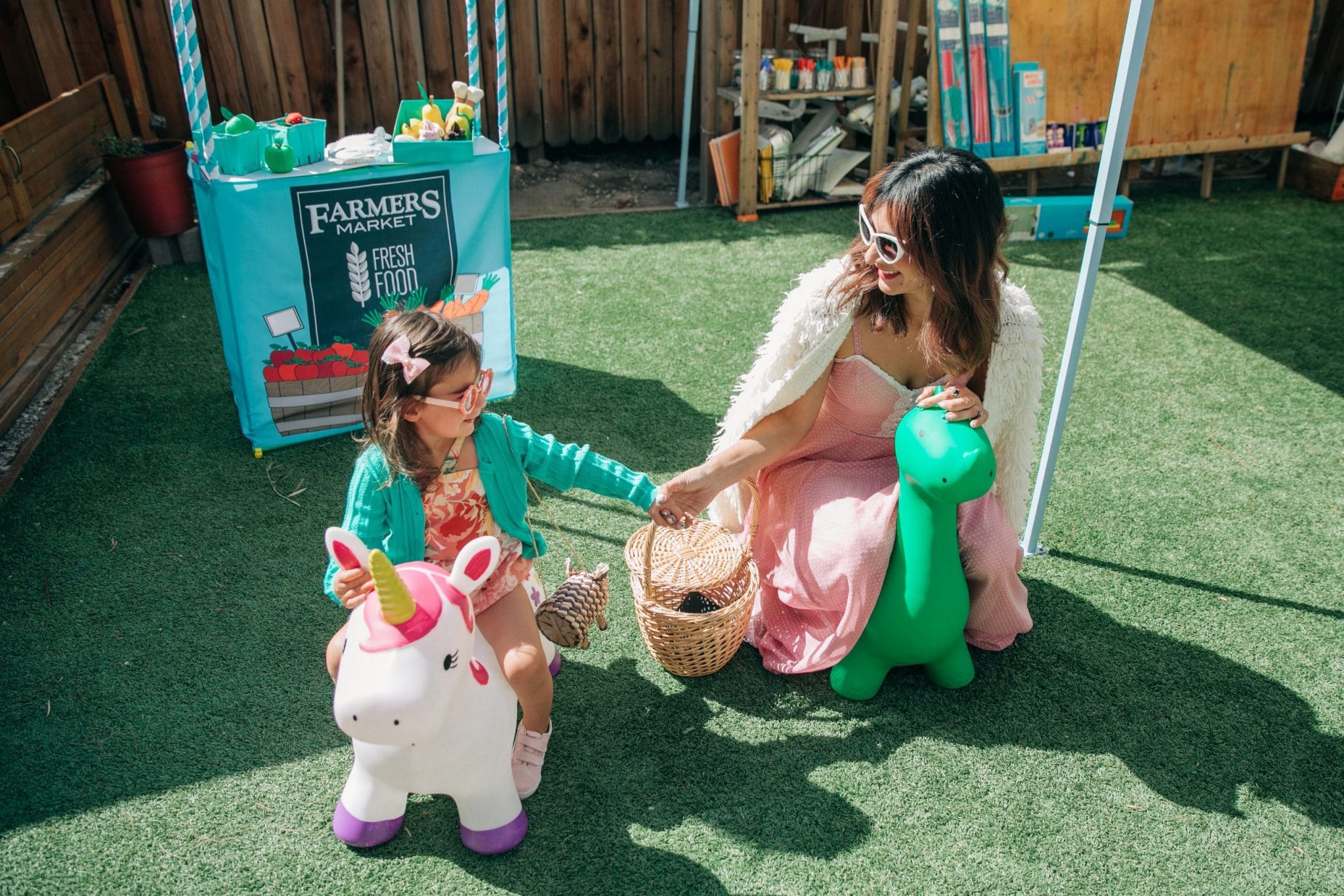 A child on a unicorn at the party