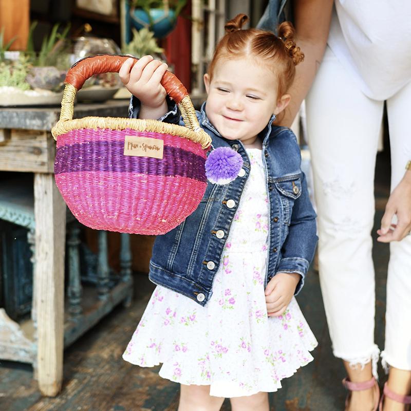 Photo - Child holding a basket