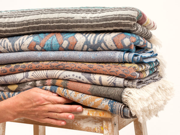 luxury minimalist throw blanket for sofa, boho chic design with fringe and tassels sand-free Turkish towels and throw blankets with tribal boho chic design