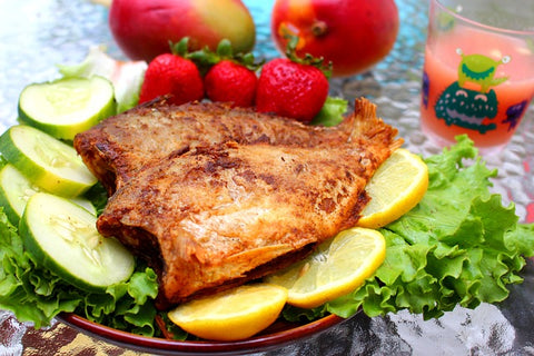 Cooked Fish Fillet on bed of lettuce