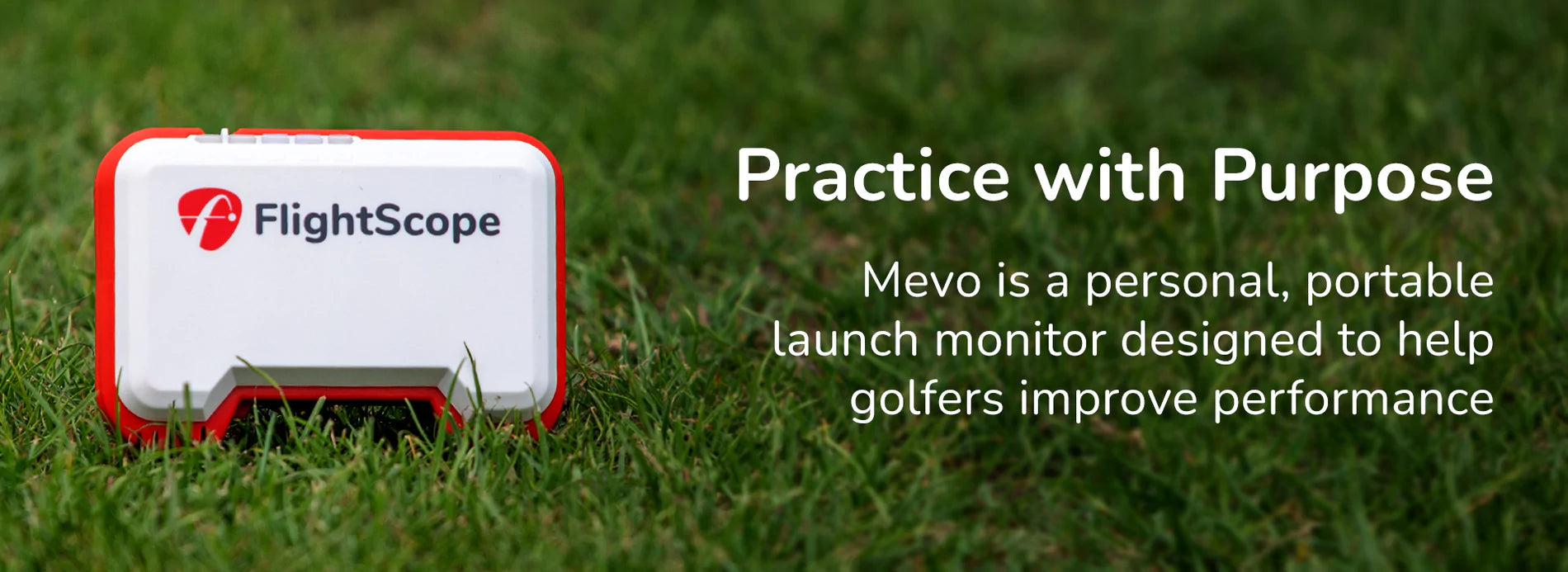 Mevo launch monitor sitting in grass