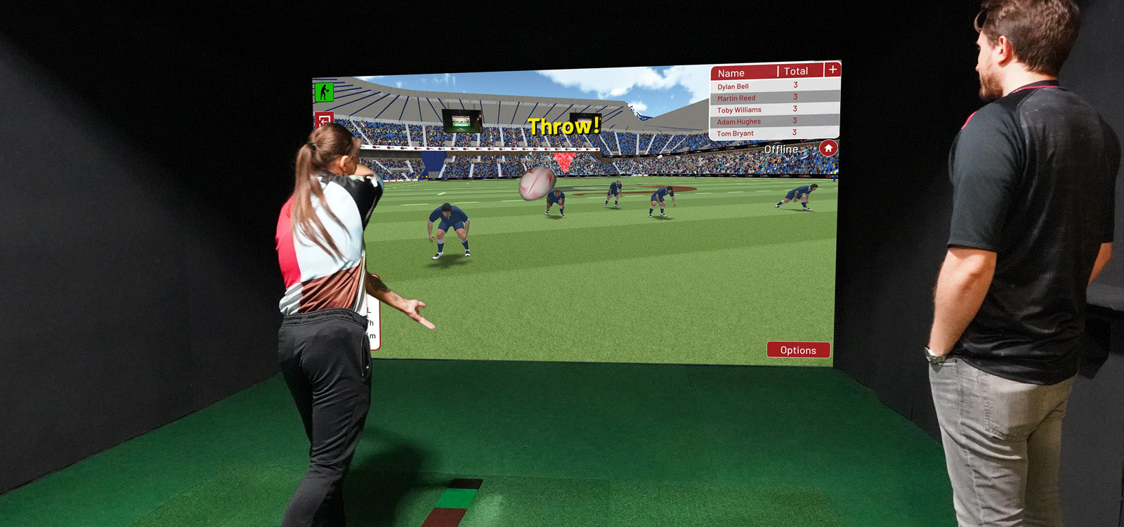 Woman throwing rugby ball in Sports Coach simulator