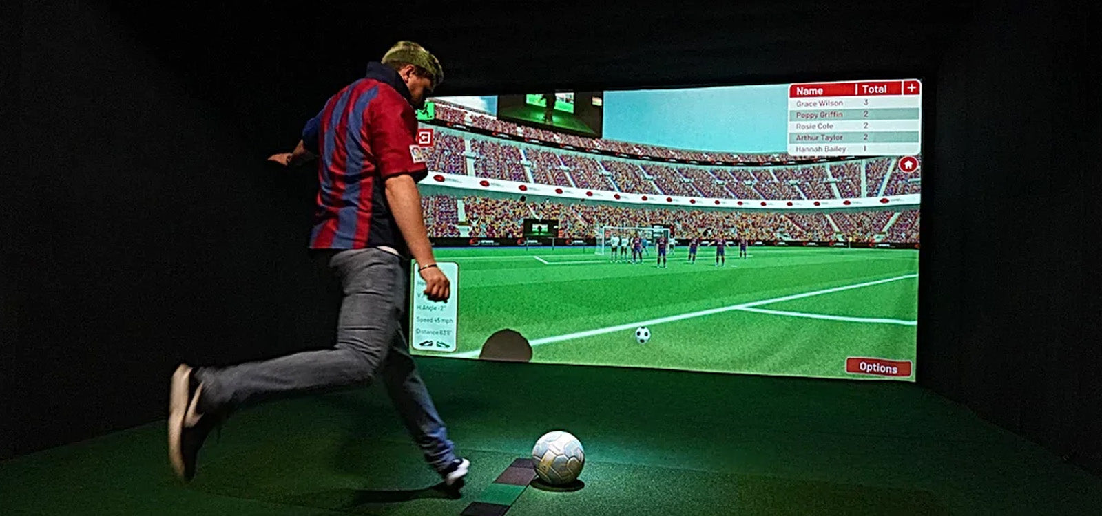 Man kicking soccer ball in Sports Coach simulator