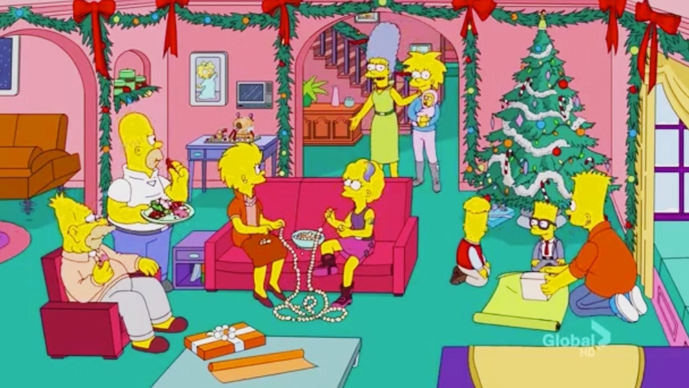 La famille Simpson dans le futur réunie dans le salon au moment de Noël.