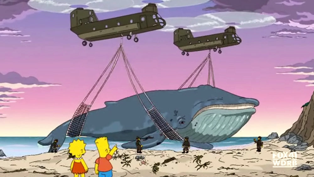 Baleine échouée sur une plage soulevée par deux hélicoptères militaire devant Bart et Lisa Simpson