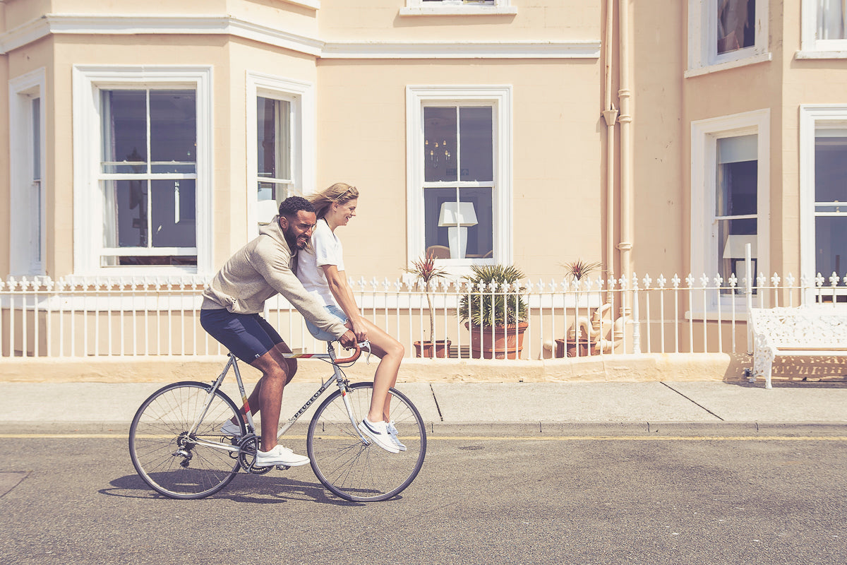 Couple riding bicycle