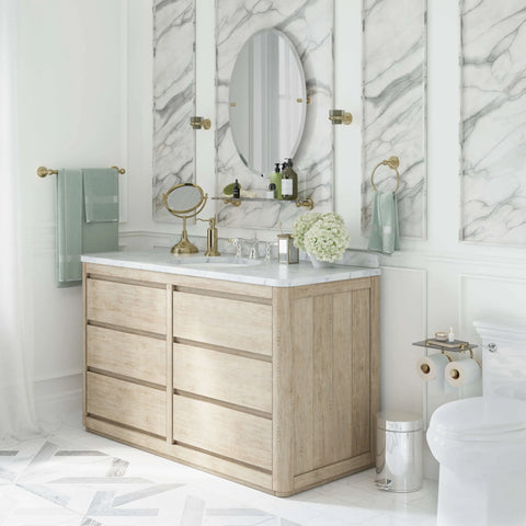 Bathroom with curated decorative brass hardware