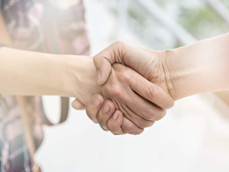 Close up of a handshake