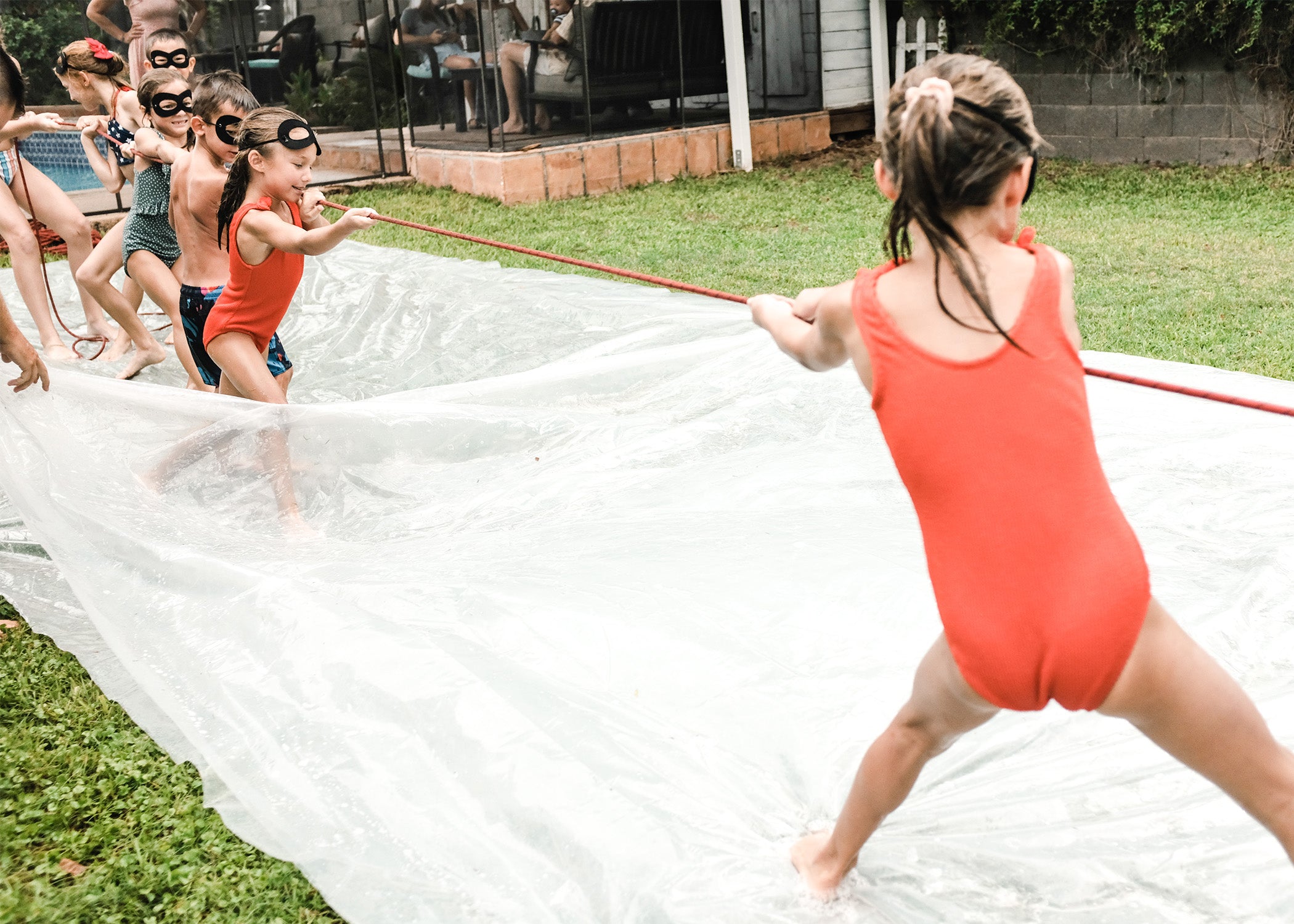 superhero tug of war slip and slide