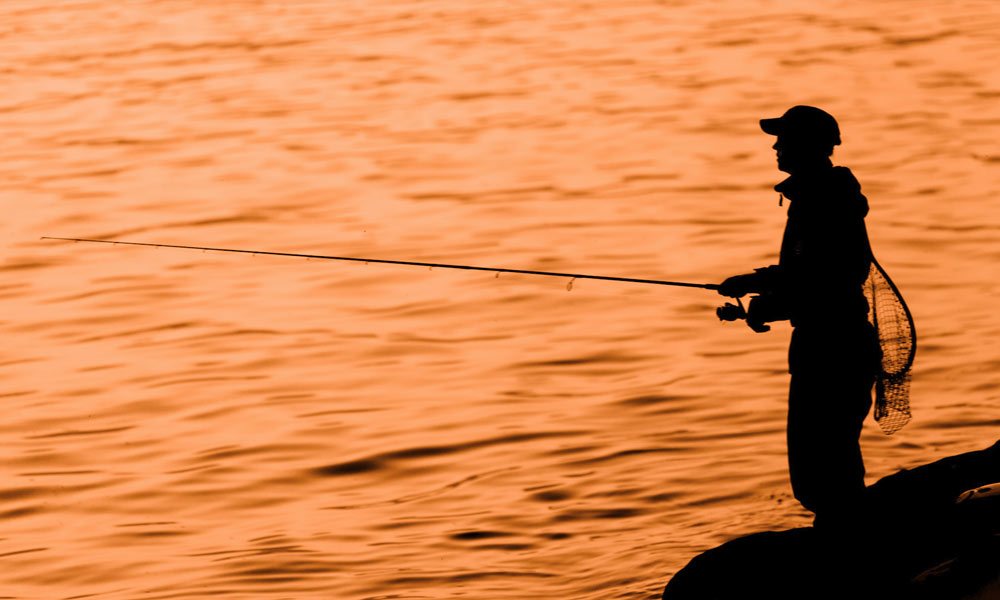 Man Fishing sunset - Solar Bat