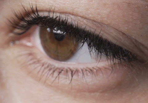 close-up of eye blinking with lash extensions