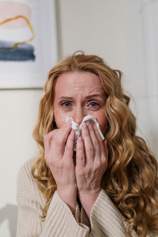 Woman crying because of Autumn blues during the Autumn months of the Autumn season