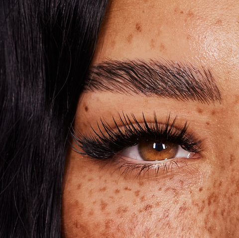 Close-up of a lash model with Kim K Lashes and brow lamination