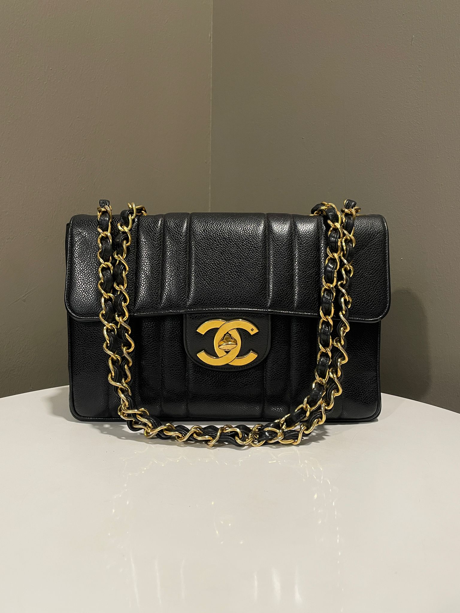 image of Chanel Vintage XL CC Vertical Flap Black Caviar