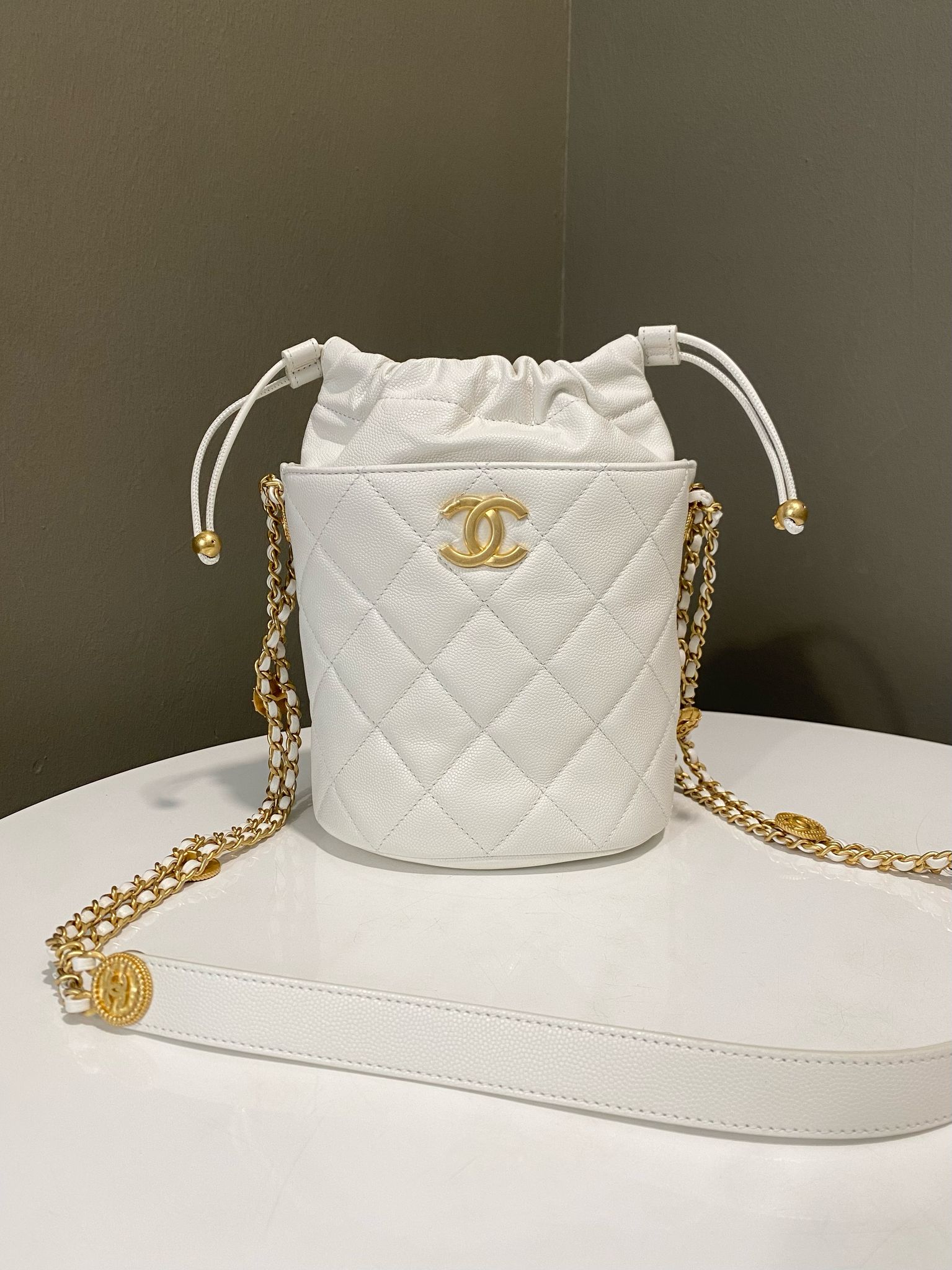 image of Chanel Twist Your Button Bucket Bag Ivory Caviar