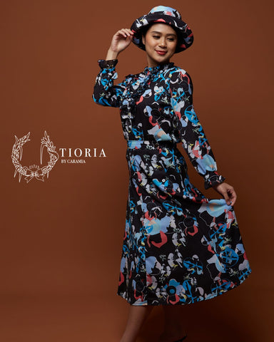 Elegant heritage-inspired apparel by Tioria by Caramia, featuring traditional Indonesian motifs, perfect for holiday gifting