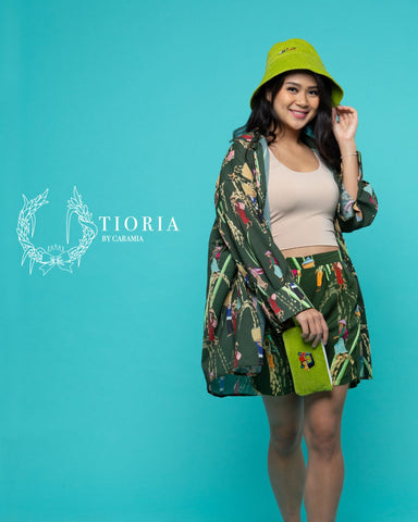 Elegant heritage-inspired apparel by Tioria by Caramia, featuring traditional Indonesian motifs, perfect for holiday gifting