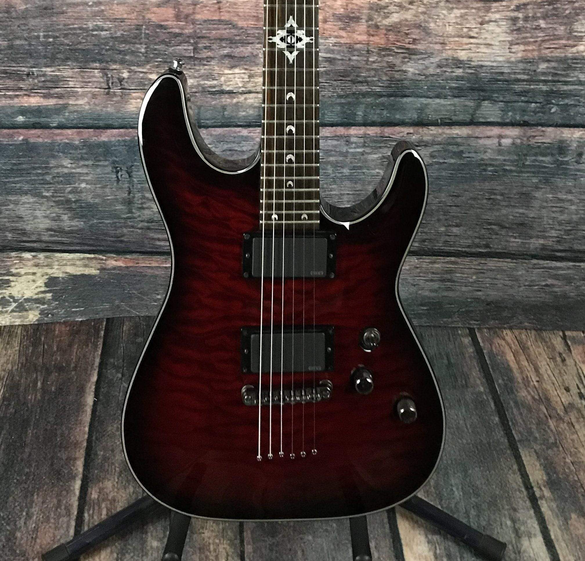 Used Schecter C-1 Hellraiser DLX with EMG's and Hard Shell Case