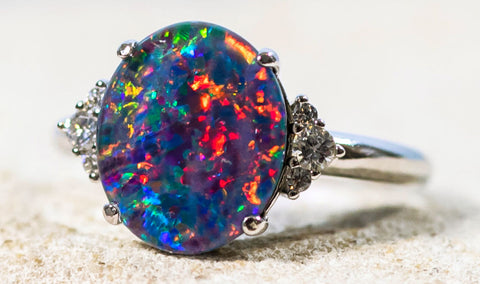Colourful silver triplet opal ring with six sparkling crystals