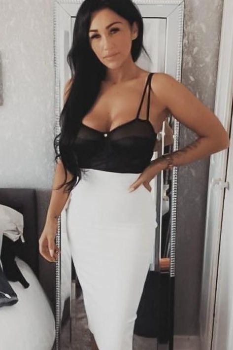 Woman wearing a figure flattering  Pencil High Waist Bandage Midi Skirt - Pearl White BODYCON COLLECTION