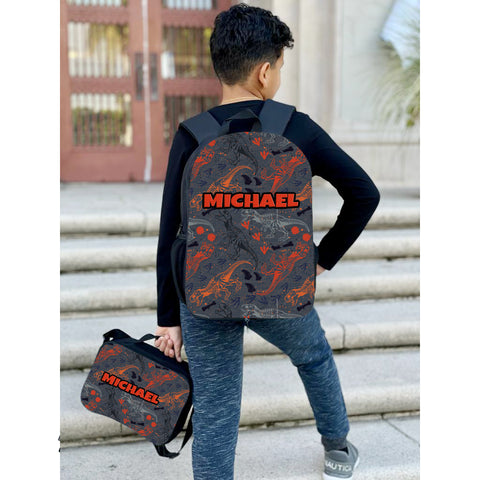 Photo of a personalized backpack and lunch bag with full-color design and custom name.