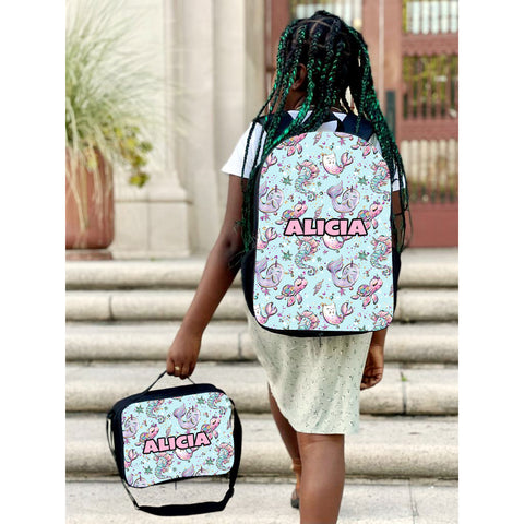 Photo of a personalized backpack and lunch bag with full-color design and custom name.