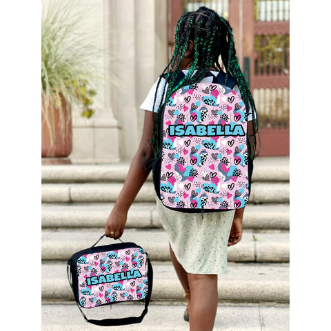 Photo of a personalized backpack and lunch bag with full-color design and custom name.