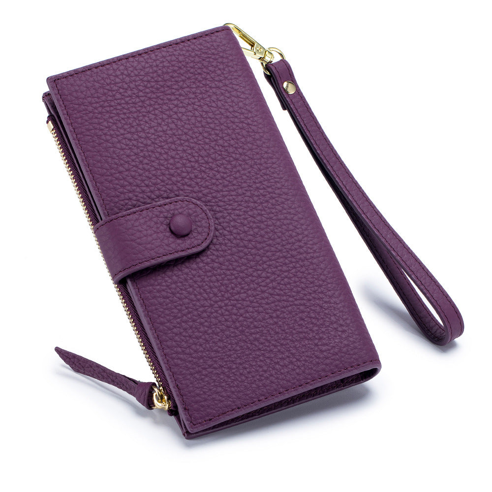 leather long wallet with wristlet strap in purple