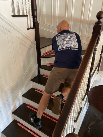 installer adding spaces on stairwell