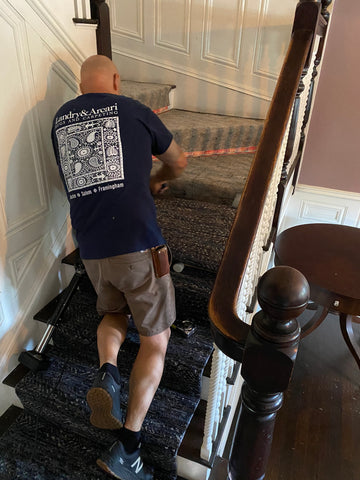 installer adding padding for the stairs