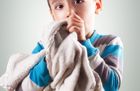 child with security blanket