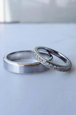 Image shows his and hers matching wedding bands
