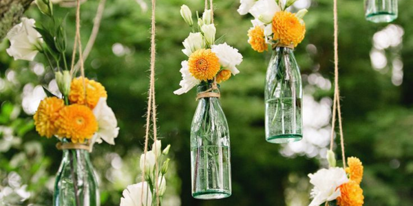 flowers in bottles for wedding decoration 