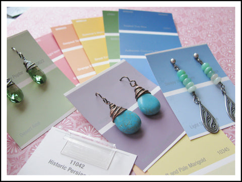 earrings stored on index cards