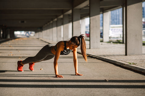 woman in high plank pose