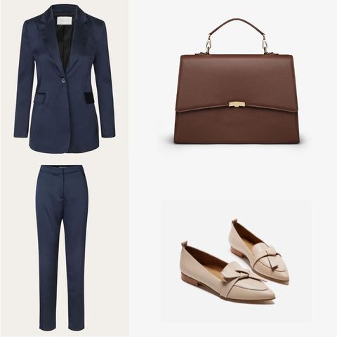 Costume bleu pour femme avec un sac business marron