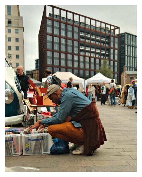A man digging for vinyl at Classic Car Boot Sale 2023