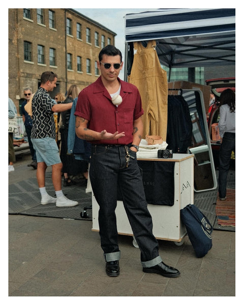 A man in Jeans throwing a baseball at Classic Car Boot Sale 2023