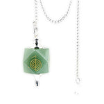 Pendule Aventurine avec son dessin en or