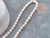 Natural white oval freshwater pearl 8-14mm, pierced cultured pearl, 35 cm thread, X1 G1937