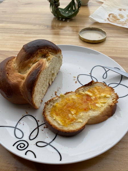 Homemade braided bread with Orange Marmelade