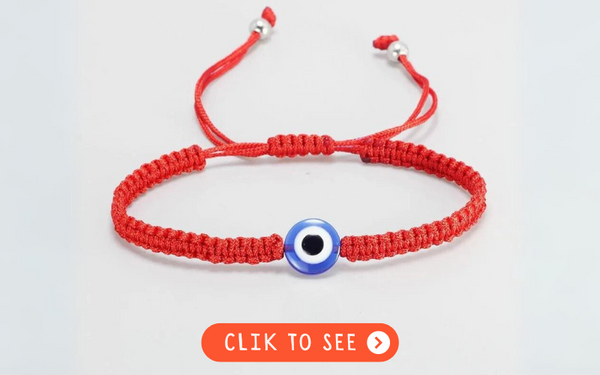 red string bracelet with evil eye