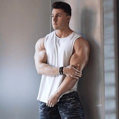 Scoop bottom muscle shirt made to transition from gym to night on the town. Comes in many colors and is fitted so the bottom accentuates your torso whether you are a short man or tall.