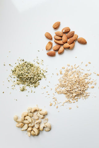 Almonds cashews soy beans oat plant based varieties of milk