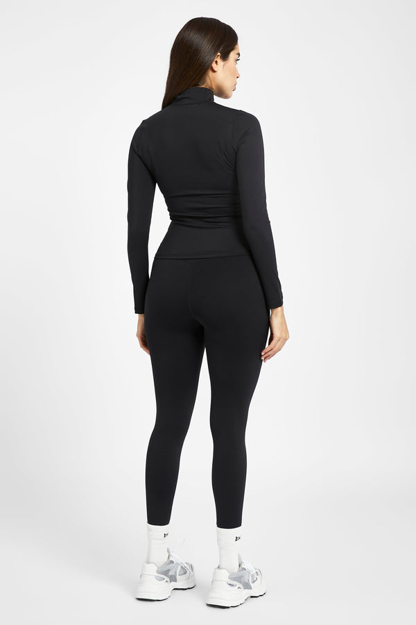 Colored leggings with black piping detail on the side – thestyleinccanada